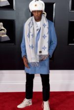 Tyler, The Creator de lenço Louis Vuitton e tênis de sua colab com a Converse